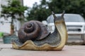 Plaster figure of a snail Royalty Free Stock Photo