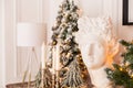 Plaster head statue on background of candels and christmass tree. Selective focus Royalty Free Stock Photo