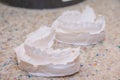 Plaster impression of teeth. Dental plaster mold. Dental mold showing teeth on a table viewed side on in a dentistry Royalty Free Stock Photo