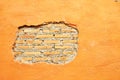 Plaster and Red brick wall damage Royalty Free Stock Photo