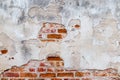Plaster and red brick wall damage. Royalty Free Stock Photo