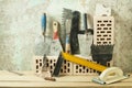 Construction tools in a row and bricks.Building and renovation concept. Royalty Free Stock Photo