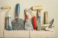 Construction tools in a row and bricks. Building and renovation concept. Royalty Free Stock Photo