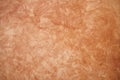 Plaster wall in orange color, sample background for web site or mobile devices Royalty Free Stock Photo