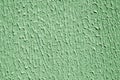 Plaster wall texture with interesting pattern in green color Royalty Free Stock Photo