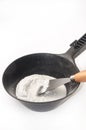 Plaster and water in a black bowl with a spatula for mixing Royalty Free Stock Photo