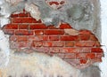 Plasterd red brick wall and grunge texture background abstract hole on cracked plaster concrete. Retro frame for design Royalty Free Stock Photo