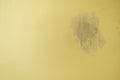 Plastered with gypsum hole in the yellow wall Royalty Free Stock Photo