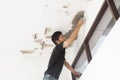 Plasterer at ceiling renovation decoration Royalty Free Stock Photo