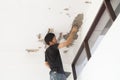 Plasterer at ceiling renovation decoration Royalty Free Stock Photo