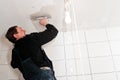Plasterer at ceiling work Royalty Free Stock Photo