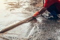 Plasterer concrete worker at floor of house construction Royalty Free Stock Photo