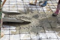 A plasterer concrete worker at floor work Royalty Free Stock Photo