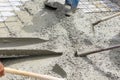 A plasterer concrete worker at floor work Royalty Free Stock Photo