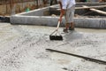 A plasterer concrete worker at floor work Royalty Free Stock Photo