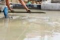 A plasterer concrete worker at floor work Royalty Free Stock Photo