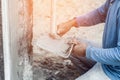 Plasterer concrete worker at wall of home Royalty Free Stock Photo