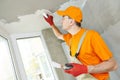 Plasterer at indoor ceiling work Royalty Free Stock Photo