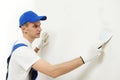 Plasterer at indoor wall work Royalty Free Stock Photo