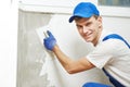 Plasterer at indoor wall work Royalty Free Stock Photo