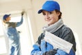 Plasterer Portrait at indoor wall work