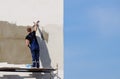 Plasterers Builders plastered wall in a commercial building. Wor