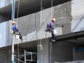 Hanging plasterers Royalty Free Stock Photo