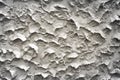 Plastering of gray  cement wall in seamless rough embossed patterns texture abstract for background Royalty Free Stock Photo