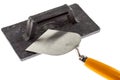 Plastering trowel and construction surfacer Royalty Free Stock Photo