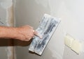 Plastering Wall With Plaste, Finishing And Plaster Spatula Trowel Royalty Free Stock Photo