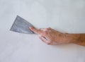 Plastering wall with plaste and plaster spatula trowel Royalty Free Stock Photo