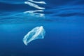 plastic bag floating on the surface of the ocean Royalty Free Stock Photo