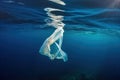 plastic bag floating on the surface of the ocean Royalty Free Stock Photo