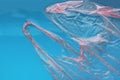 Plastic bag floating on water surface, top view. Ocean pollution Royalty Free Stock Photo