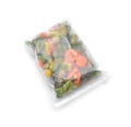 Plastic bag with frozen vegetables on white background Royalty Free Stock Photo