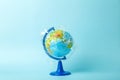 Plastic bag pollution concept. Earth globe in a plastic bag on a colored background. Plastic and waste pollution oceans, nature Royalty Free Stock Photo