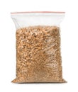 Plastic bag of wooden chips Royalty Free Stock Photo