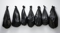 plastic bags black for bin garbage, bag for trash waste, garbage, rubbish, plastic bag pile isolated on white background Royalty Free Stock Photo