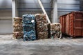 Plastic bales of rubbish at the waste treatment processing plant. Recycling separatee and storage of garbage for further disposal