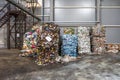 Plastic bales of rubbish at the waste treatment processing plant. Recycling separatee and storage of garbage for further disposal Royalty Free Stock Photo