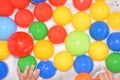 Plastic balls of different colors in bubble bath Royalty Free Stock Photo