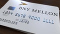 Plastic card with logo of the Bank of New York Mellon BNY. Editorial conceptual 3D animation
