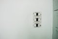Plastic bare switch stick on white wall in room. this image for Royalty Free Stock Photo