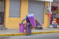 Plastic basket seller, the streets of Quito. Ecuador. Street vendors. 01.13.2019