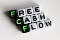 Plastic Beads Spelling `Free Cash Flow` On White
