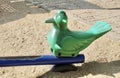 Plastic Bird Seesaw in A Kid Playground