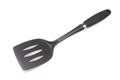 Plastic black spatula for a frying pan isolated on white background Royalty Free Stock Photo