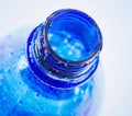Plastic blue bottle of drinking water Royalty Free Stock Photo
