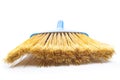 Plastic blue brooms isolated on white background