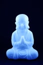 Plastic blue buddha sculpture